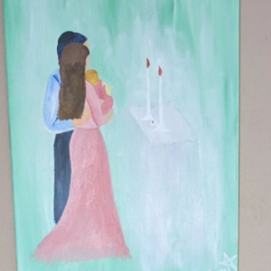 Couple with Baby with Shabbos Candels